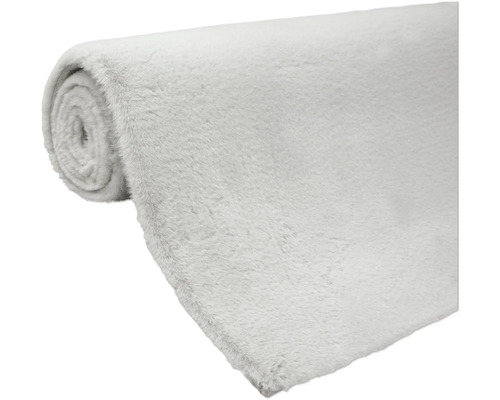 Zrolovaný koberec z umelej kožušiny