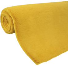 Žltý metrový textil zrolovaný
