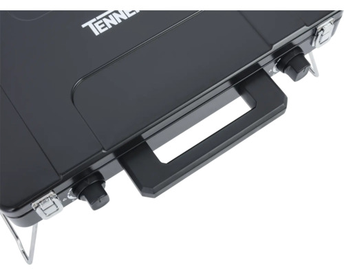 Detailný pohľad na prenosný plynový varič Tenneker s rukoväťou a otočnými gombíkmi.