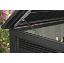 Detailný pohľad na otvorené veko úložného boxu s tlmičom