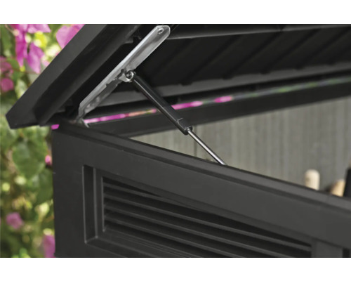 Detailný pohľad na otvorené veko úložného boxu s tlmičom