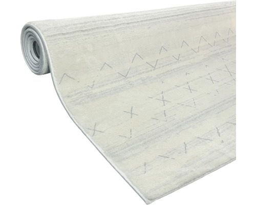 Zrolovaný koberec so vzorom