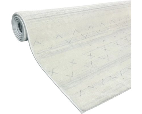 Zrolovaný koberec so vzorom