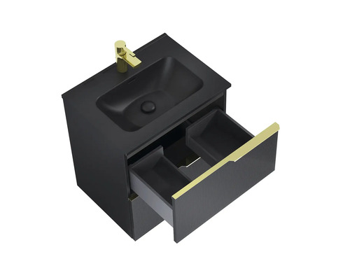 Umývadlová skrinka s otvorenou zásuvkou a batériou