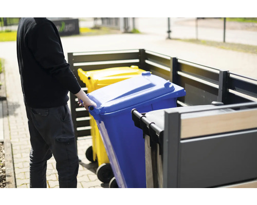 Kontajnerový box s modrou a žltou smetnou nádobou