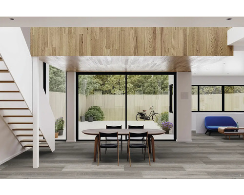 Svetlá obývacia izba so schodiskom, jedálenskou súpravou a sivou podlahou