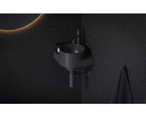 Moderná kúpeľňa s okrúhlym umývadlom a osvetleným zrkadlom