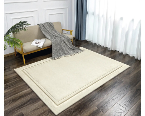Béžový obdĺžnikový koberec do obývačky s okrajom