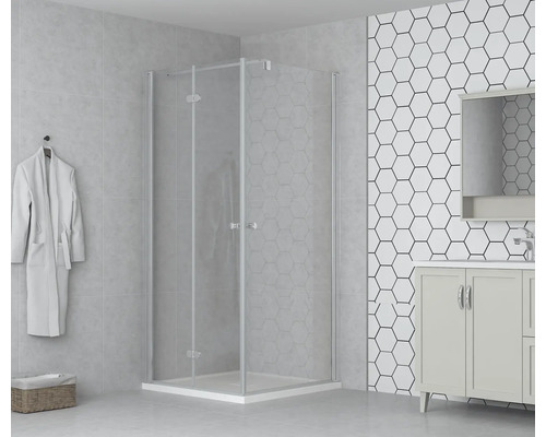 Kúpeľňa so sprchovacím kútom, skrinkou pod umývadlo a županom na stene