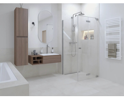 Svetlá kúpeľňa so sprchou, umývadlom a radiátorom na uteráky