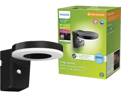 Vonkajšie solárne nástenné svietidlo Philips a obal produktu