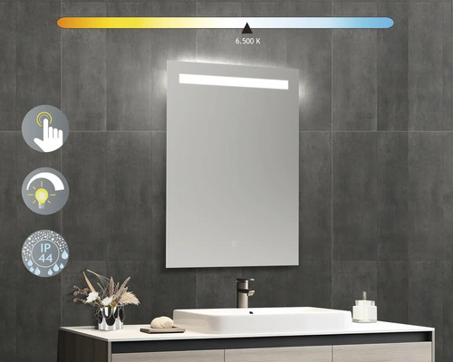 Osvetlené zrkadlo do kúpeľne s dotykovým senzorom a krytím IP44 na sivej stene