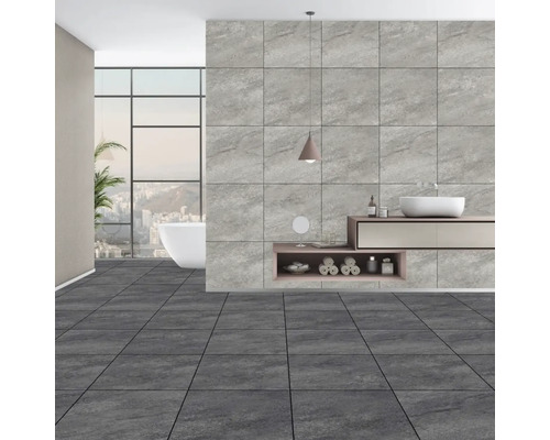 Moderná kúpeľňa so sivou dlažbou a obkladmi, umývadlom a vaňou