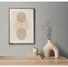 Dekoratívny obraz s kruhovým vzorom v drevenom ráme na stene