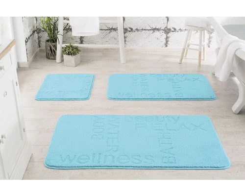 Tri svetlomodré kúpeľňové predložky s motívom wellness v kúpeľni