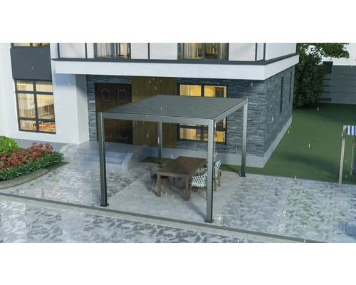 Pergola so stolom a stoličkami pred domom
