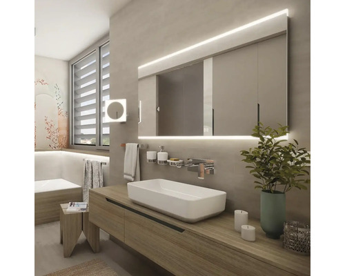 Moderná kúpeľňa s umývadlom, osvetleným zrkadlom a dekoráciami