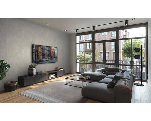 Svetlý obývací pokoj s pohovkou, konferenčným stolíkom a televízorom