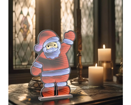 Dekoratívna LED figúrka Santa Clausa na stole