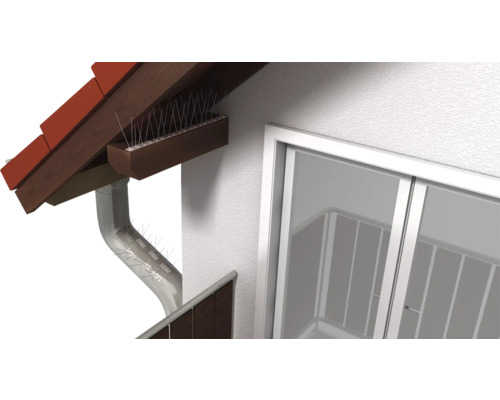 Hroty proti holubom inštalované na streche a odkvape