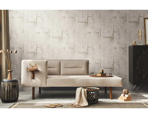 Obývacia izba s pohovkou, odkladacím stolíkom a dekoratívnymi prvkami