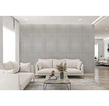 Obývacia izba s pohovkami, konferenčným stolíkom a štruktúrovaným obkladom stien pre moderný dizajn interiéru.