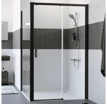 Sprchovací kút s čiernym rámom a sklenenou stenou v kúpeľni