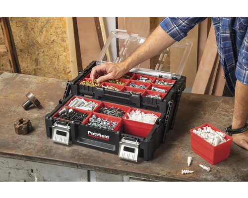 Naplnený kufor na náradie Pattfield s priehľadným vekom a červenou vložkou