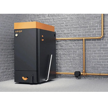 Kotol na tuhé palivá s rúrkami pred tehlovou stenou