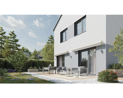 Moderný dom s terasou a záhradným nábytkom