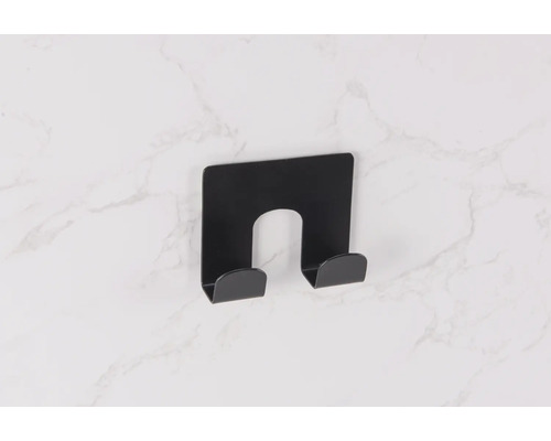 Čierny držiak na montáž na stenu