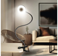 Svietidlo s klipom, flexibilným ramenom a kruhovým LED svetlom na stole