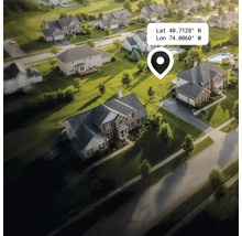 Letecký pohľad na obytnú oblasť s domami, záhradami a ulicami