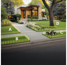 Robotická kosačka na trávniku pred moderným domom