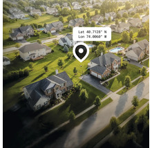 Letecký pohľad na obytnú oblasť s domami, záhradami a ulicami