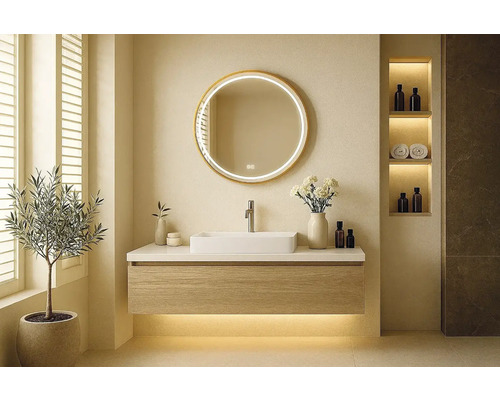 Moderná kúpeľňa s umývadlom, okrúhlym zrkadlom a dekoratívnymi prvkami pre štýlové prostredie