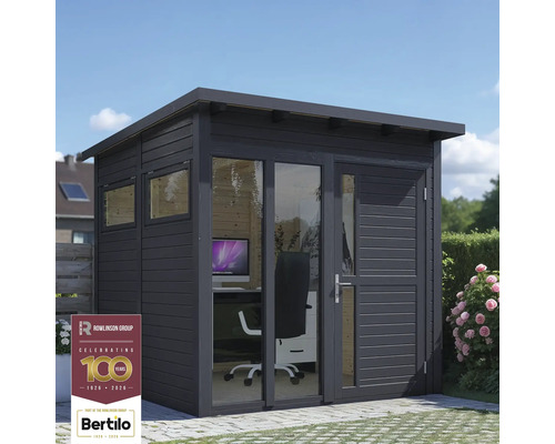 Moderný záhradný domček so sklenenou prednou stranou a kancelárskym vybavením.