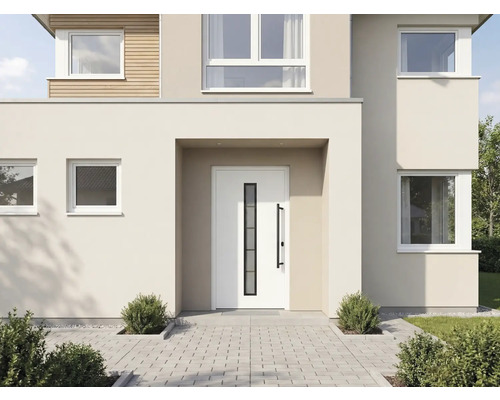 Moderný dom s vchodovými dverami a dláždenou cestou