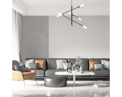 Moderná obývacia izba so sivou pohovkou, kreslom a stropným svietidlom