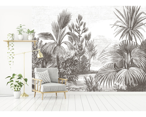 Obývacia izba s kreslom a fototapetou s rastlinnými motívmi