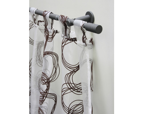 Záclona so slučkovým závesom a abstraktným vzorom na záclonovej tyči