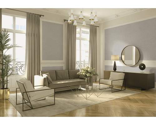 Obývacia izba s pohovkou, kreslami, konferenčným stolíkom, príborníkom, lampou a dekoráciou