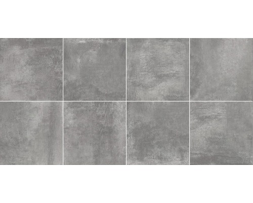 Sivé dlaždice s cementovým vzhľadom, vhodné na obklady stien a podláh.