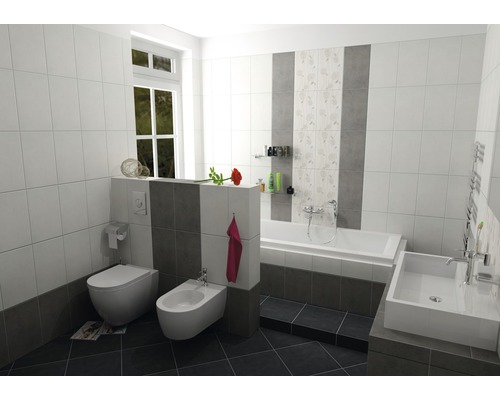 Svetlá kúpeľňa s toaletou, bidetom, vaňou a umývadlom.