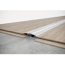 Hliníkový prechodový profil medzi dvoma podlahovými krytinami