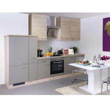 Kuchynská zostava so skrinkami, drezom, varnou doskou, rúrou a jedálenským stolom