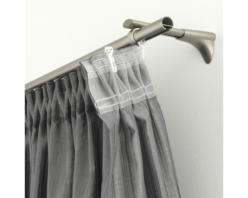Tyč na závesy so závesom na stene