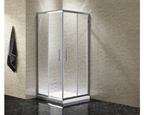 Rohová sprcha s čírymi sklenenými dverami a striebornými rámami v kúpeľni