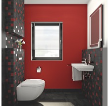 Moderná kúpeľňa s nástenným WC, umývadlom a červenými akcentmi