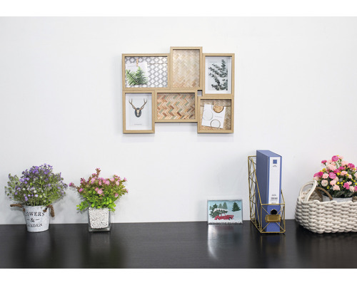 Nástenná dekorácia s rámami a dekorácia na písací stôl